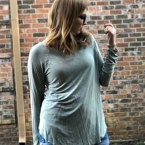 Green long sleeved tunic.